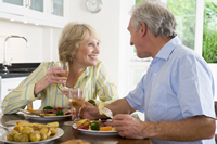couple eating together happily