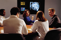 doctors looking at brain xray image
